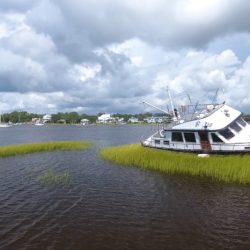 Aground boat runs