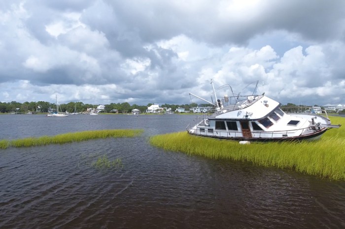 Aground boat runs